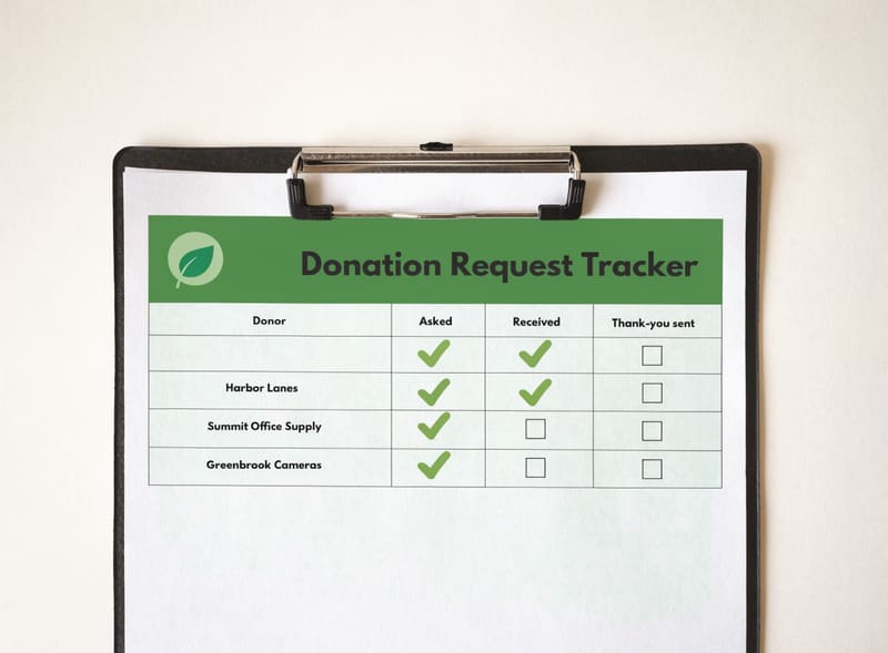 Sample donation request tracker listing fictional donor names with asked, received, and thank-you status checkmarks